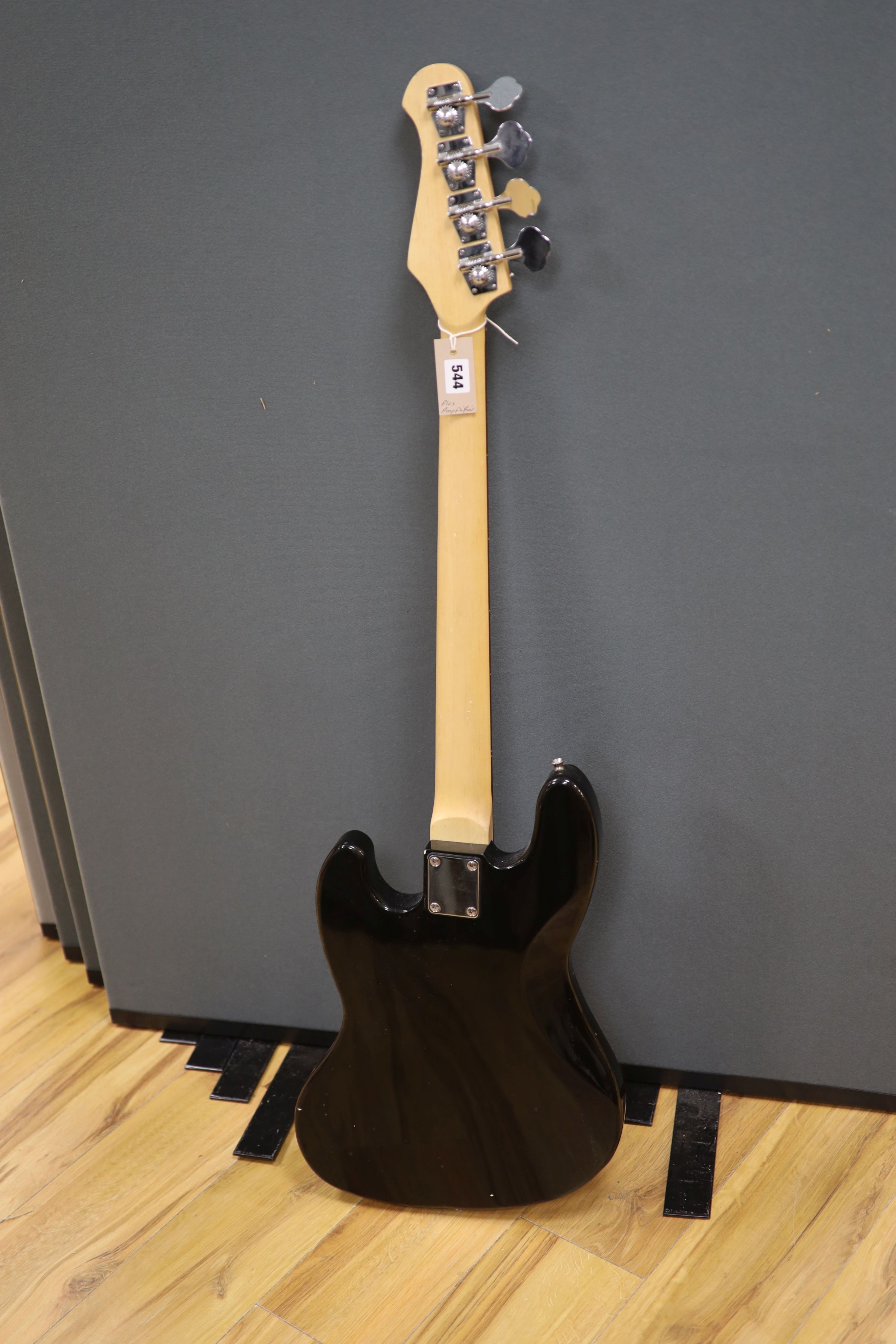 A Rock tile electric base guitar and a Great amplifier